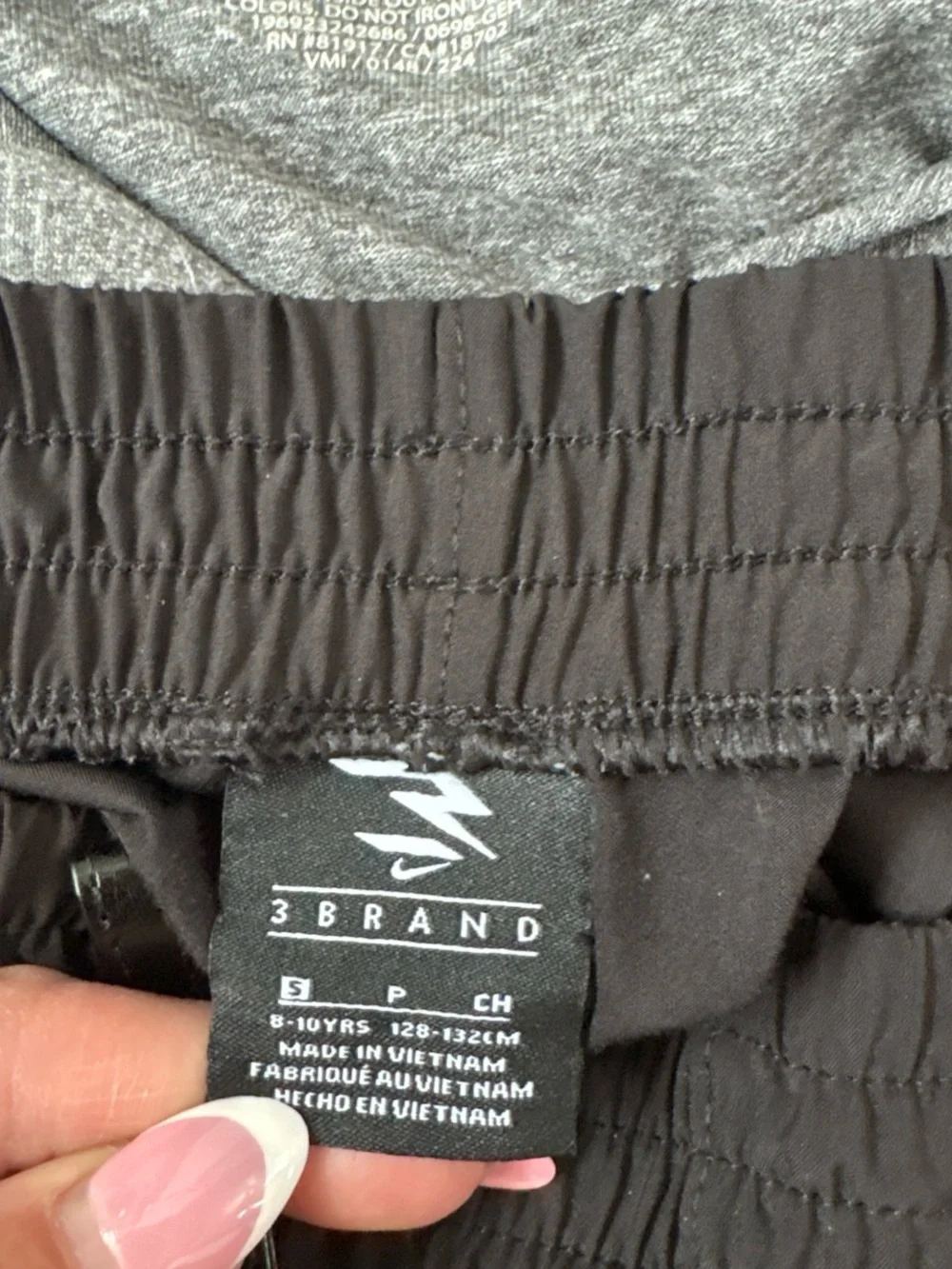 Nike gray polo shirt paired with black shorts - Picture 7 of 8
